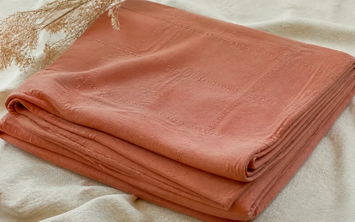 Editorial still life of woven cloth, representing fabrics & textiles sourcing in Jaipur, Rajasthan