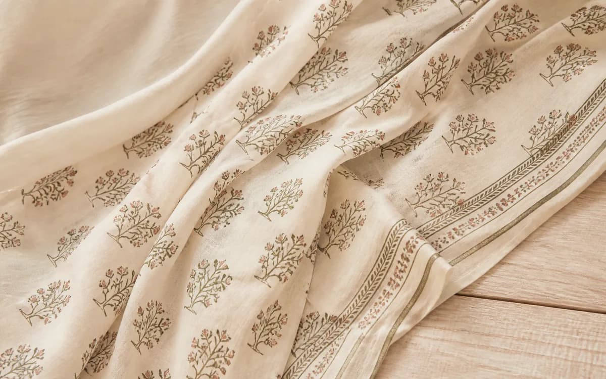 Editorial still life of a uniform collar, representing uniforms & workwear sourcing in Jaipur, Rajasthan